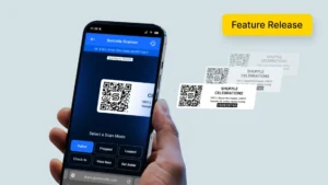 Mobile phone scanning multiple barcodes in a warehouse setting with Goodshuffle Pro's barcoding feature.