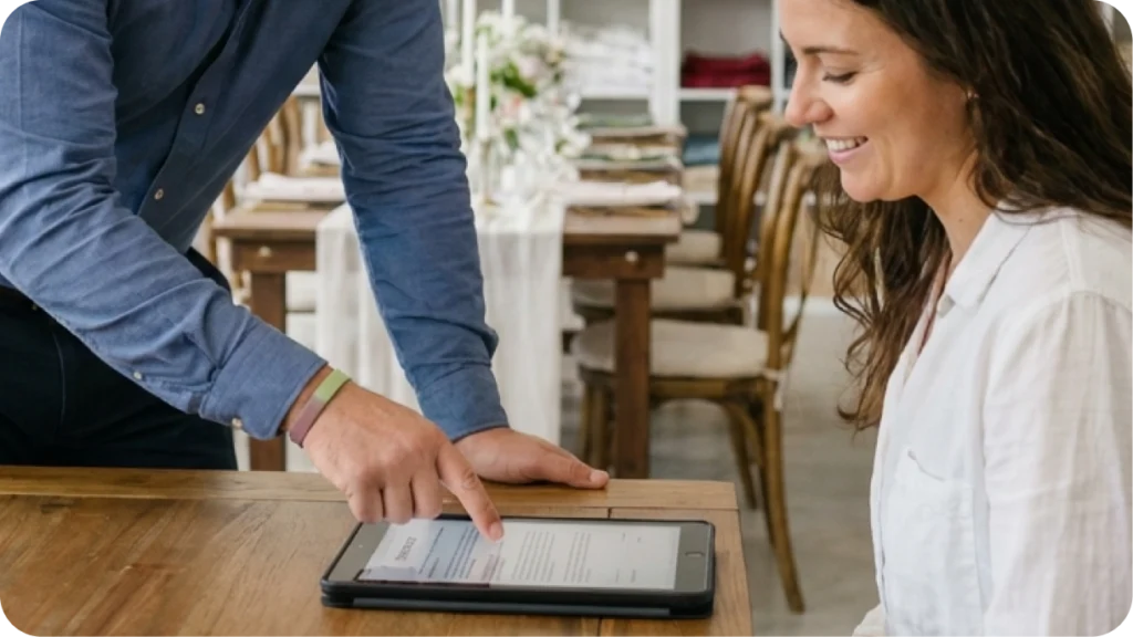 vent rental business owner reviewing contract terms and policies with client